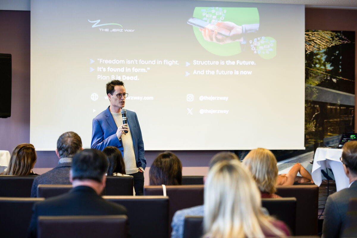 Jerz speaking at a conference in Austria